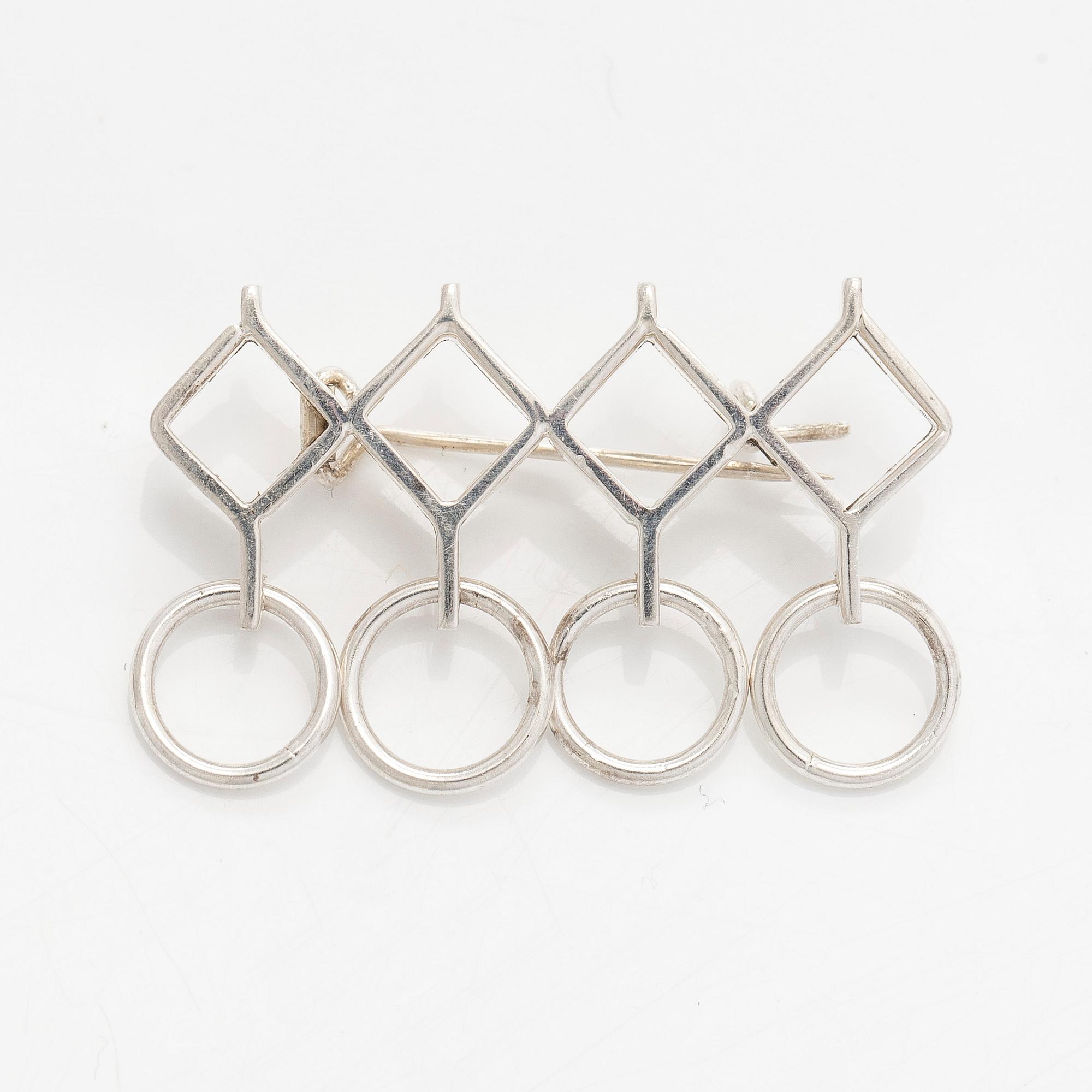 Jorma Laine, a set of two silver pendants, a bracelet and a brooch. Kultateollisuus Oy, Turku 1965-1972.