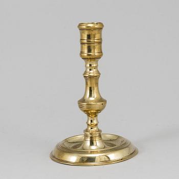 A bronze candlestick, 17th/18th century.
