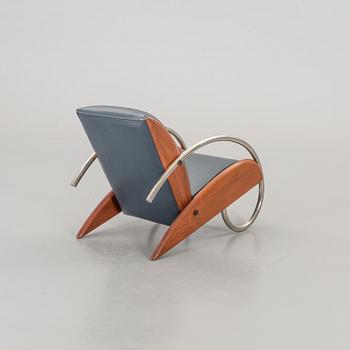 AN "STEAMLINE" ARMCHAIR BY KLAUS WETTERGREN, DENMARK, 1980'S.