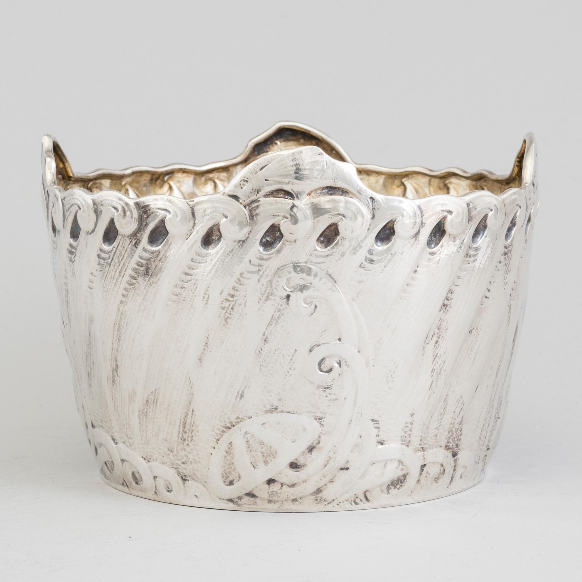 A Swedish Art Nouveau silver planter bowl decorated with stylized marine motif maker's mark K Anderson, Stockholm, 1911.