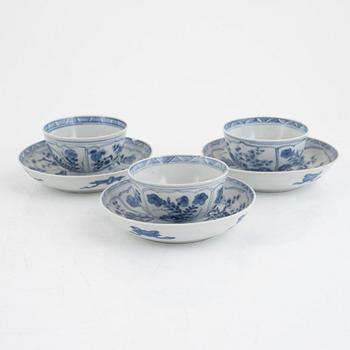 Three Kangxi cups with saucers and five Qianlong cups with saucers, China, 18th century.