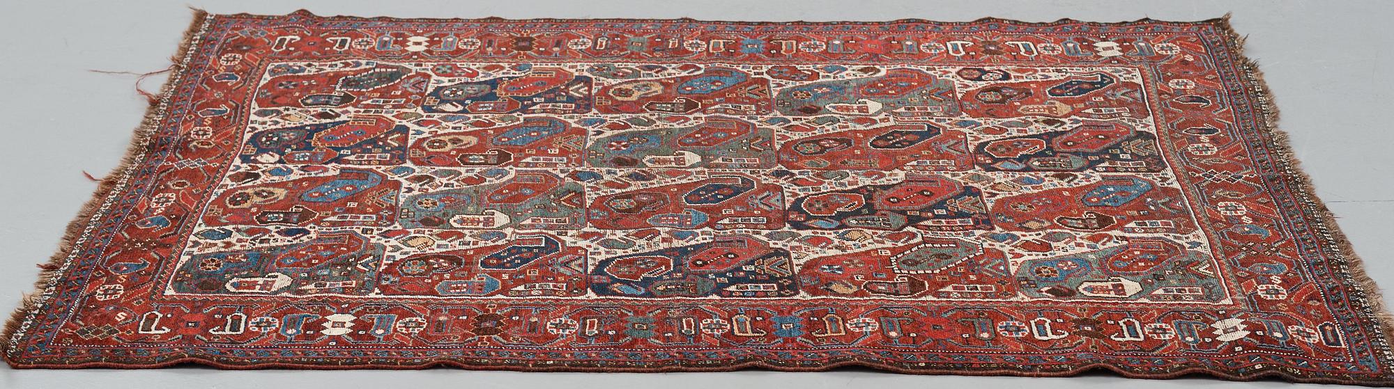A RUG, antique/semi-antique Qashqai, "Mother-and-Child", ca 184,5 x 149 cm.