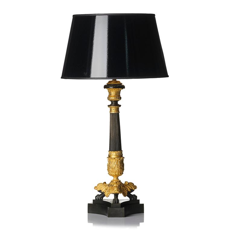 A French Louis Philippe ormolu and patinated bronze lamp, first part 19th century.