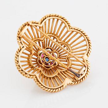 En brosch och ett par örhängen 18K guld med blå och rosa safirer.