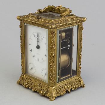 A travelling clock, signed "Potonie Paris", France, second half of the 19th century.