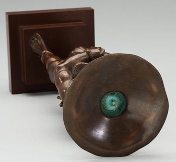 A Japanese bronze sculpture with a bowl, Meiji.