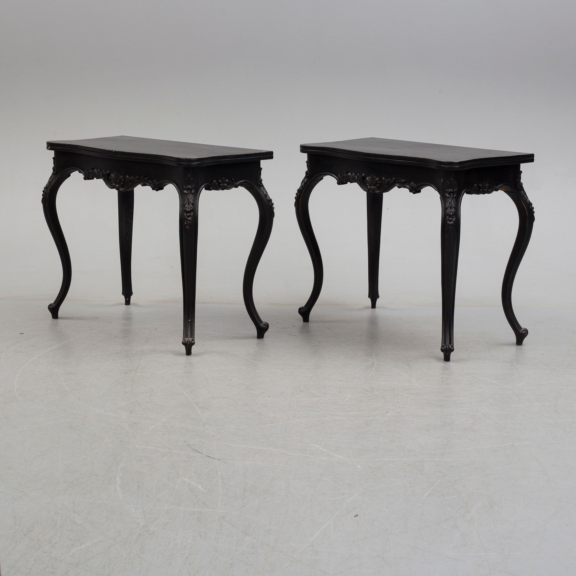 A pair of end of the 19th century new rococo style painted card tables.