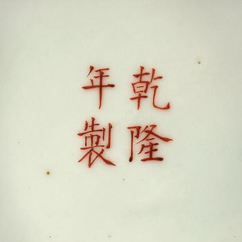 A famille rose vase, China, Republic, 20th Century, with Qianlong four character mark in red.