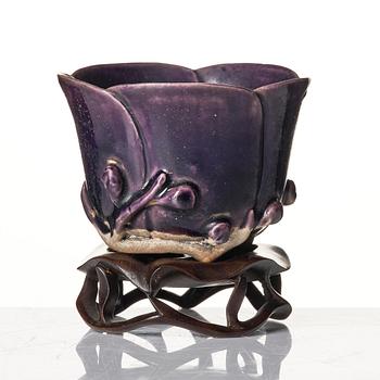 An aubergine glazed lotus cup, Qing dynasty, Kangxi (1662-1722).