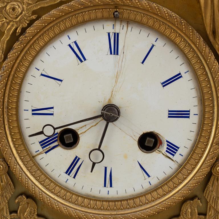 A patinated bronze mantel clock, by L.B.P. Japy & Cis, first half of the 19th century, Empire.