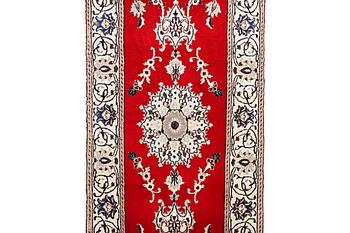 A runner carpet, Nain, part silk, 9 laa, c. 378 x 84 cm.