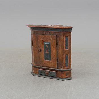 A 18/19th century  pine wall cabinet.