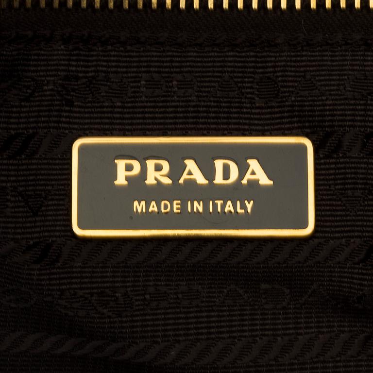 A bag and a wallet by Prada, pony hair.