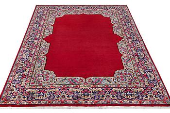 A Kerman carpet, signed Mirani, c. 290 x 208 cm.