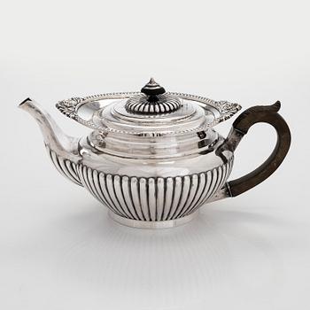 An early 20th-century sterling silver teapot, Walker & Hall, Sheffield, 1903.