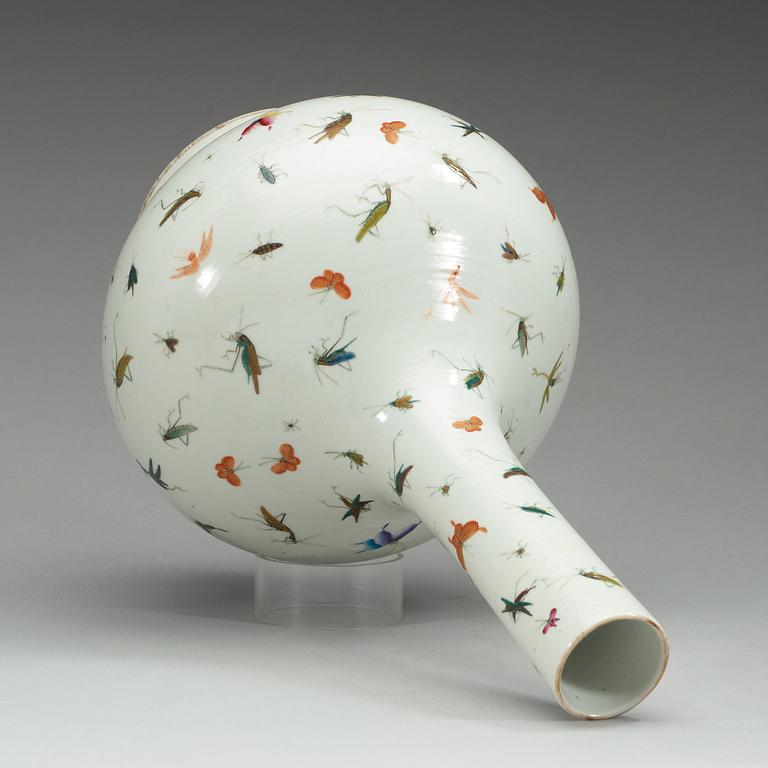 A Chinese butterfly and cricket vase.