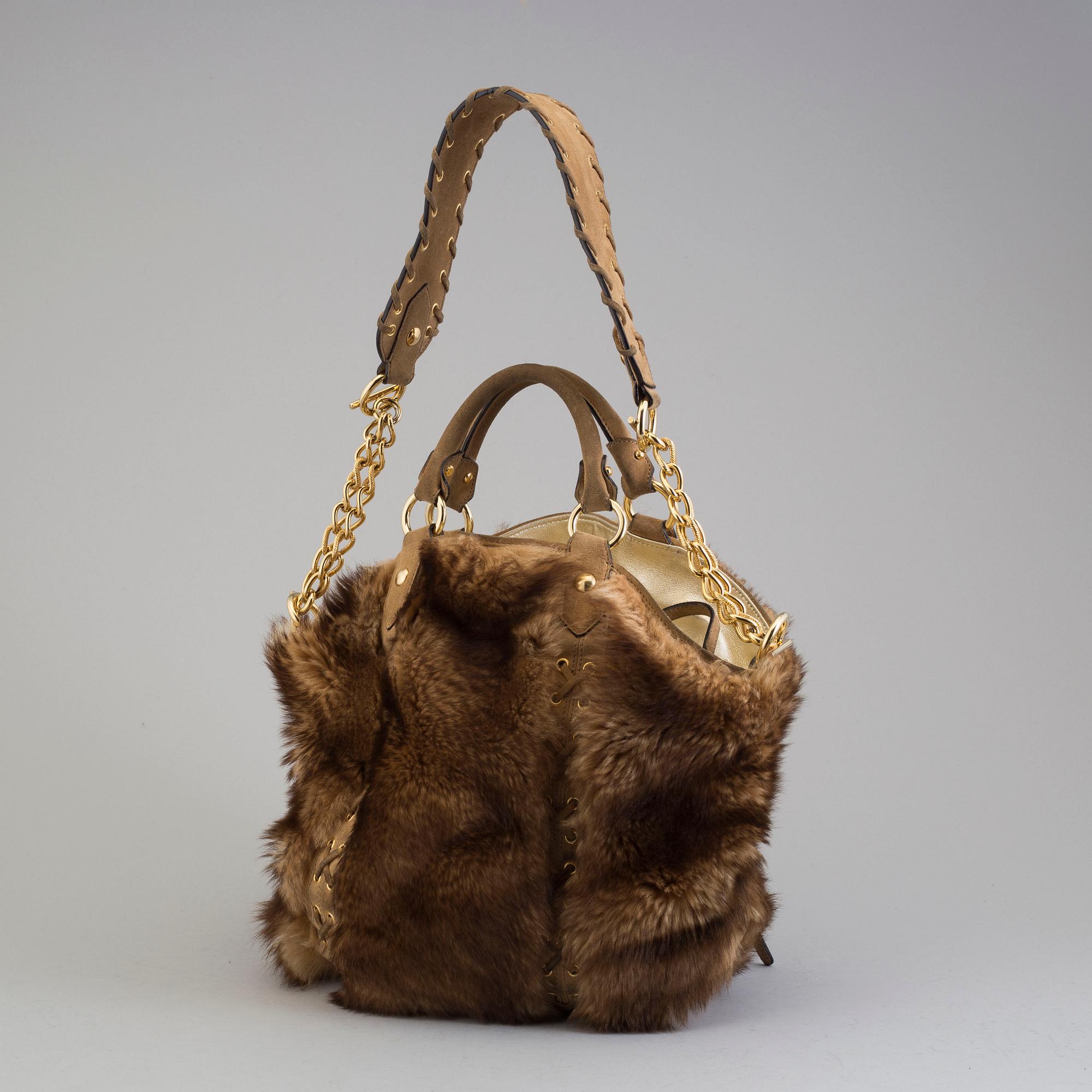 VÄSKA, Roberto Cavalli.
