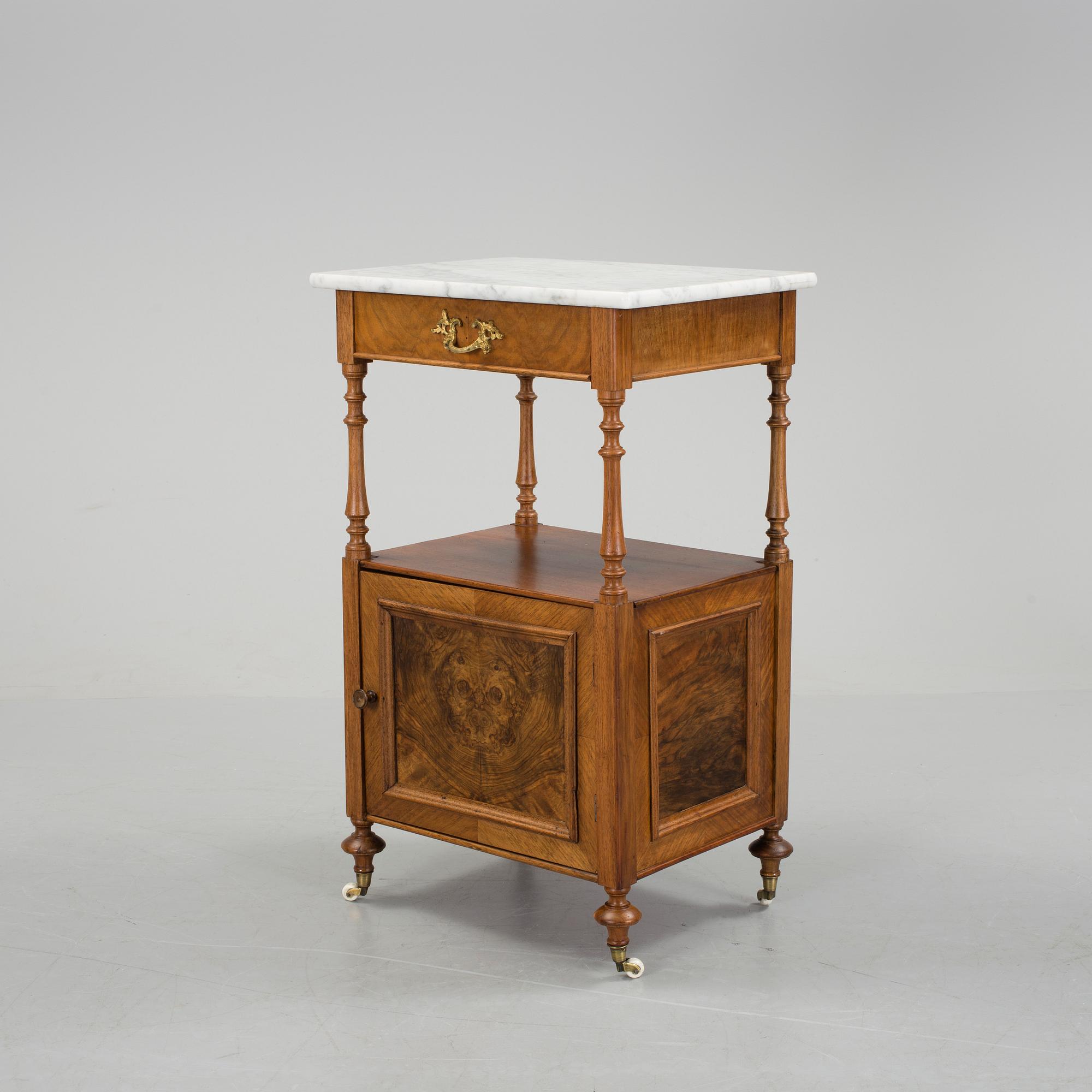 A walnut and mahogany bedside table, late 19th Century.