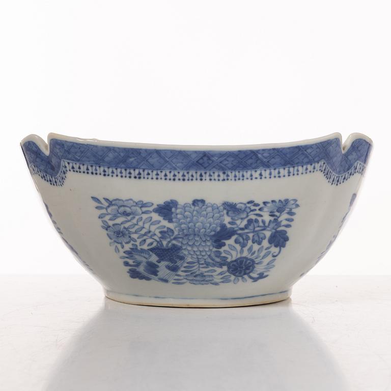 A group  of three serving dishes, a serving bowl, a cup, and seven plates, porcelain, including China 18th century.