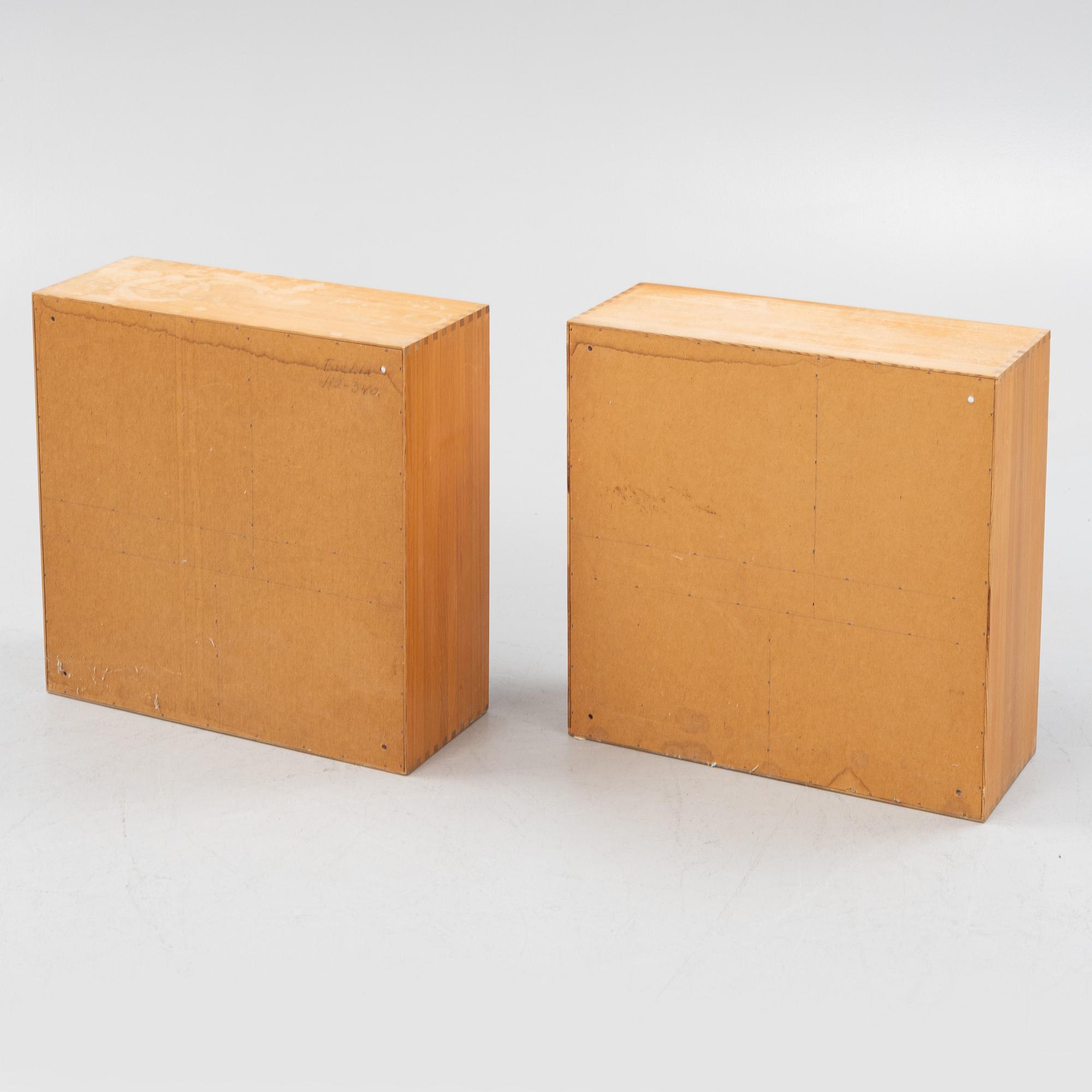 A pair of bedside tables / shelf modules, 1950s-60s.