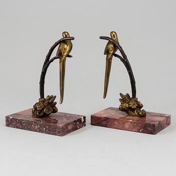 A pair of bronze and marble book-ends, first half of the 20th century.