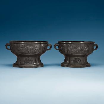 A pair of bronze flower pots, Qing dynasty, with Xuande six character mark to the interior.