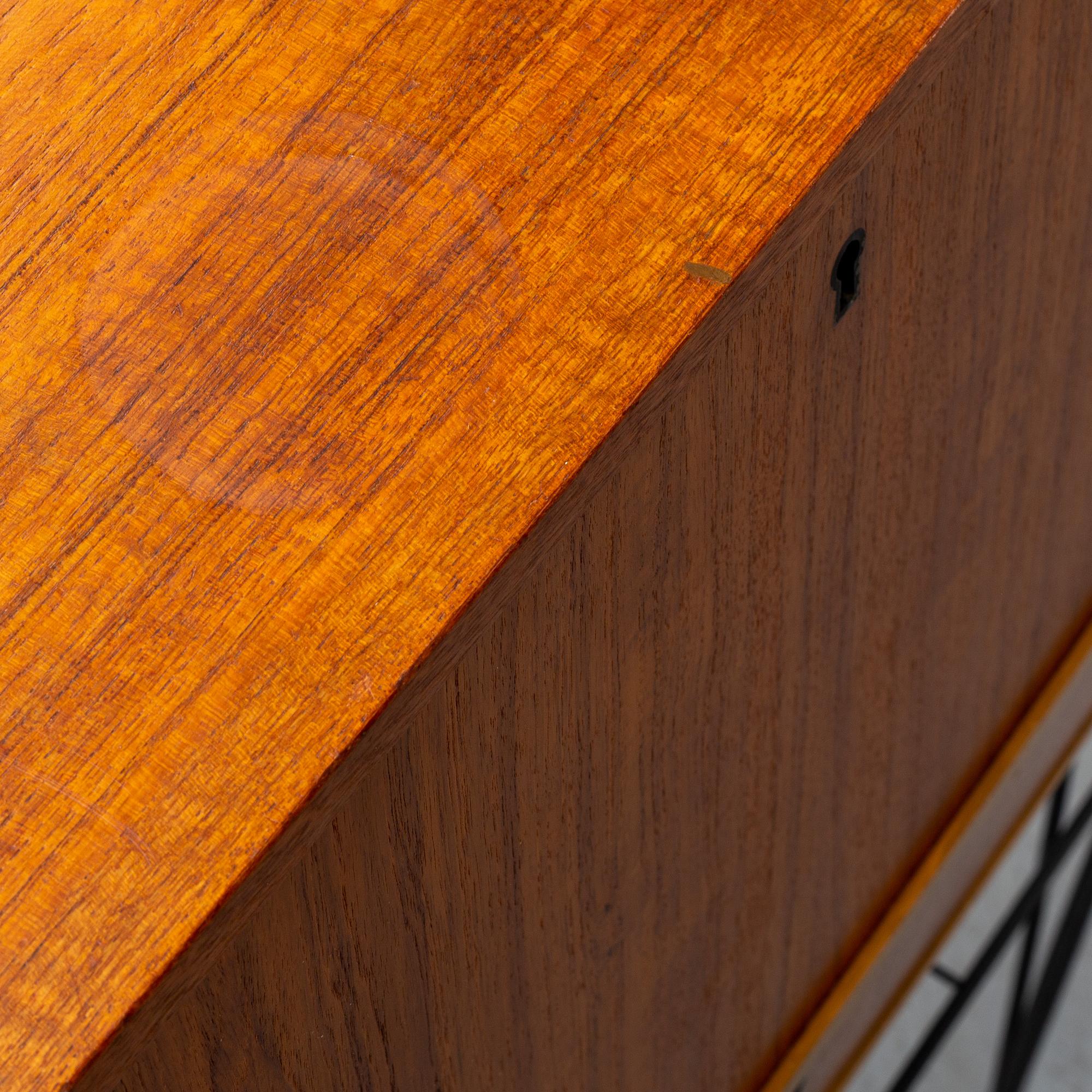 A Swedish teak veneered 'Bang' secretaire, circa 1960s, from Ikea.