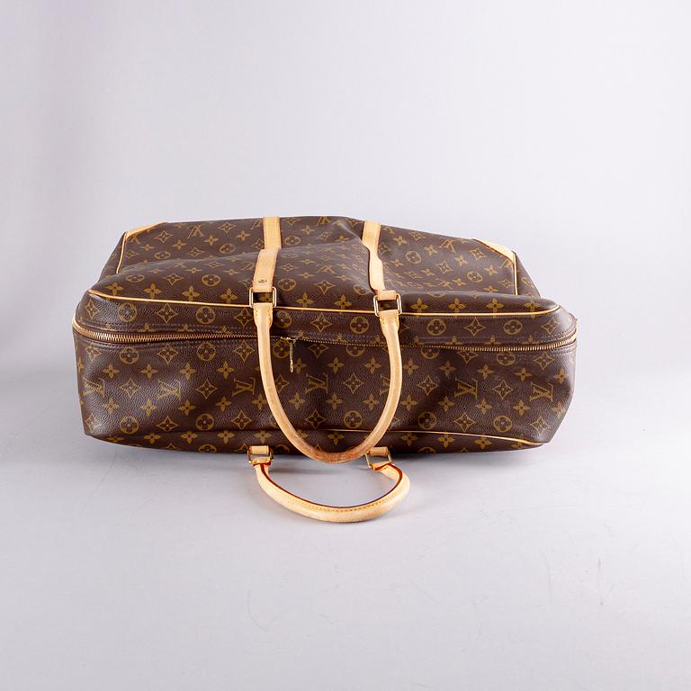 A Louis Vuitton travel bag.