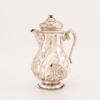 A 20th century Neo Rococo silver coffee pot (no hallmarks), weight 823 grams.