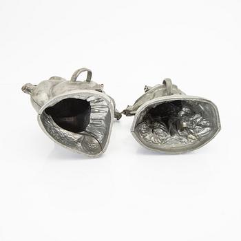 A set of four pewter icecream moulds around 1900.