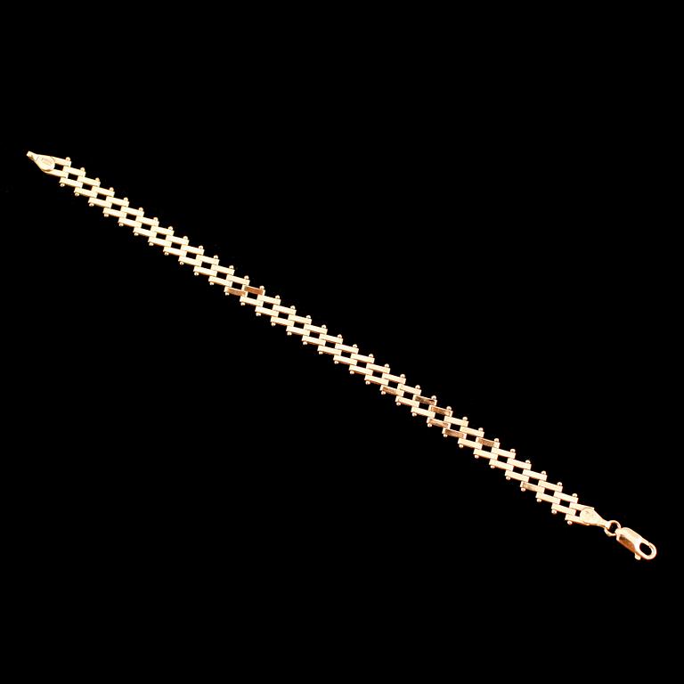 ARMBAND, 18 k guld. Vikt ca 9 gram.