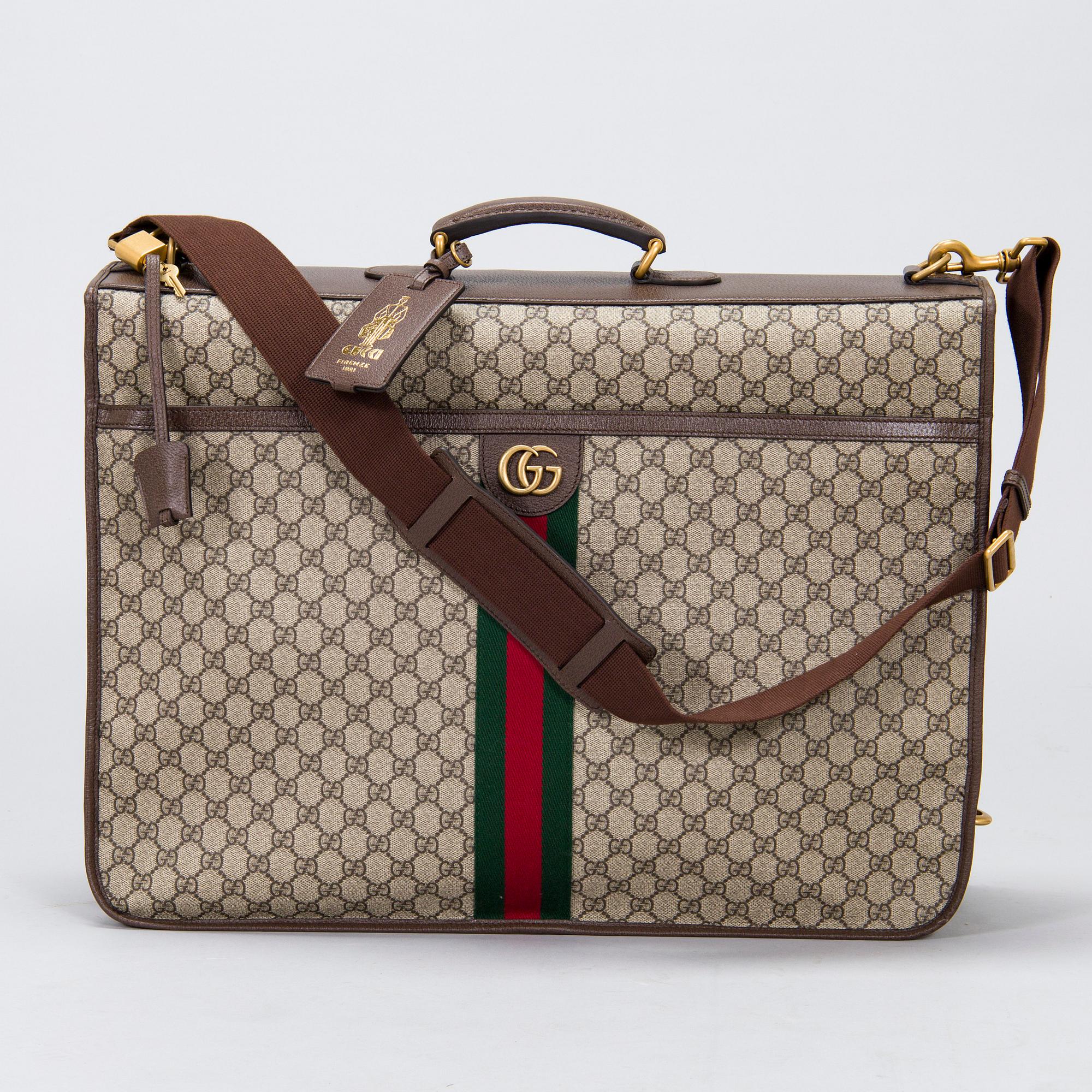Gucci, a 'Savoy' garment bag.