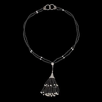 1282. SAUTOIR, gammal- och rosenslipade diamanter med onyxkulor, ca 1915.