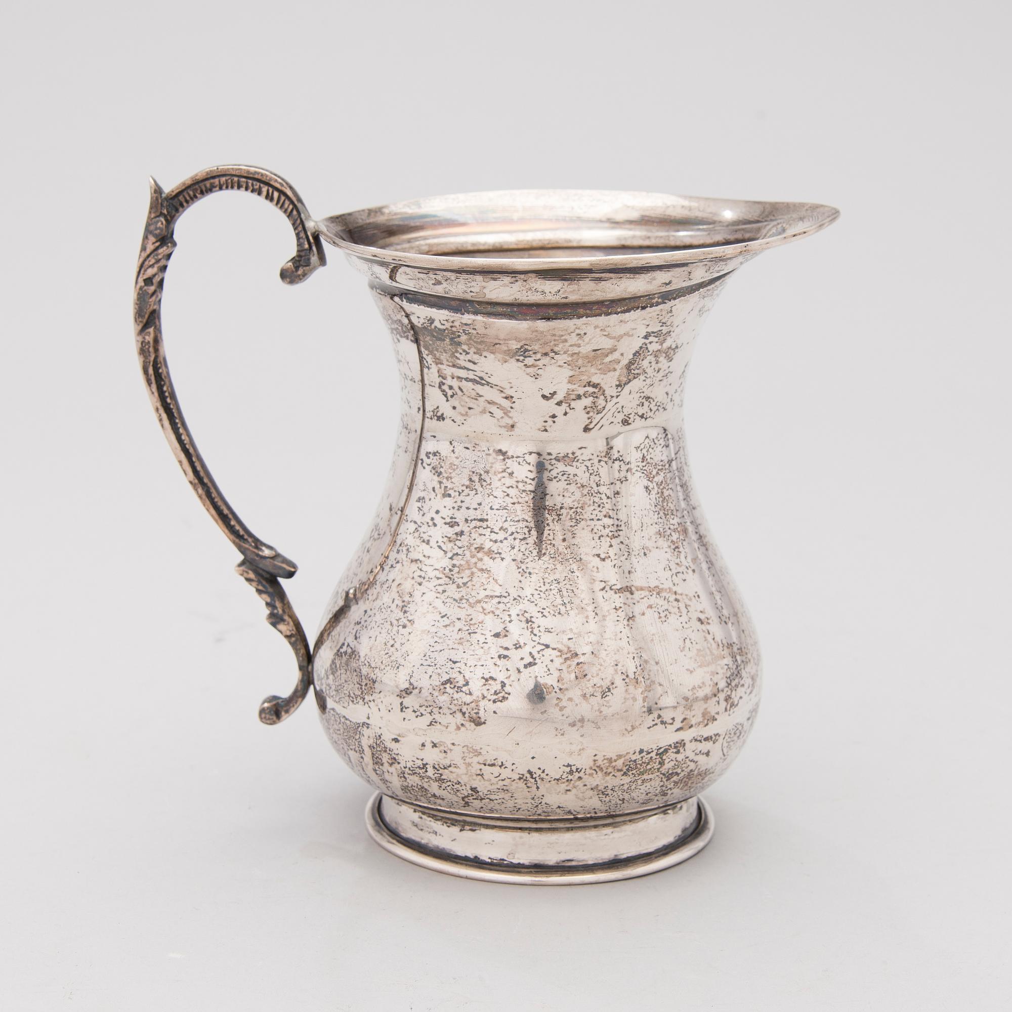 A silver pitcher from Egypt, latter half of the 20th century.
