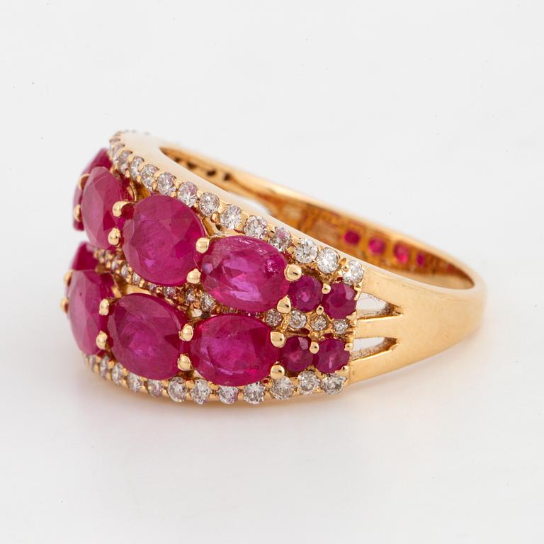 Oval shaped ruby and brilliant-cut diamond ring.