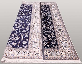 A carpet, Nain part silk s.k 6LAA, ca 300 x 212 cm.