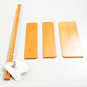 A 1950s shelving system,"Veggen de Luxe" by Torbjørn Afdal & Rolf Hesland for i.a. Ringerike Møbel- og Trevarefabrikk.