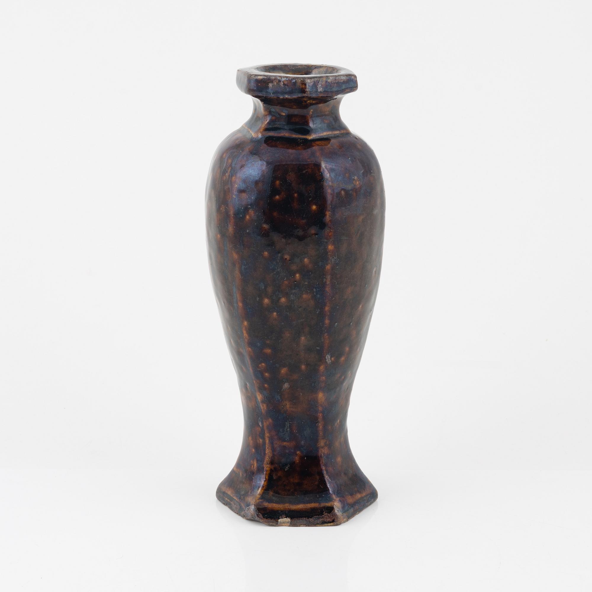 A brown glazed vas, Ming dynasty (1368-1644).