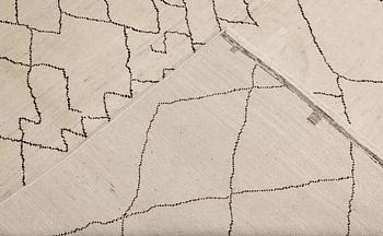 A Moroccan carpet, 293 x 186 cm.