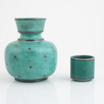 Wilhelm Kåge and Josef Ekberg, ten pieces of green glazed stoneware, Sweden, mid 20th century.