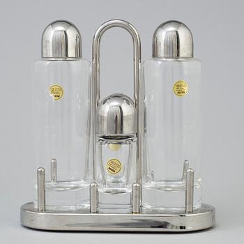 2 pieces of Alessi stainless steel table ware.