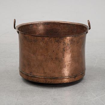 A 19th Century copper pot.