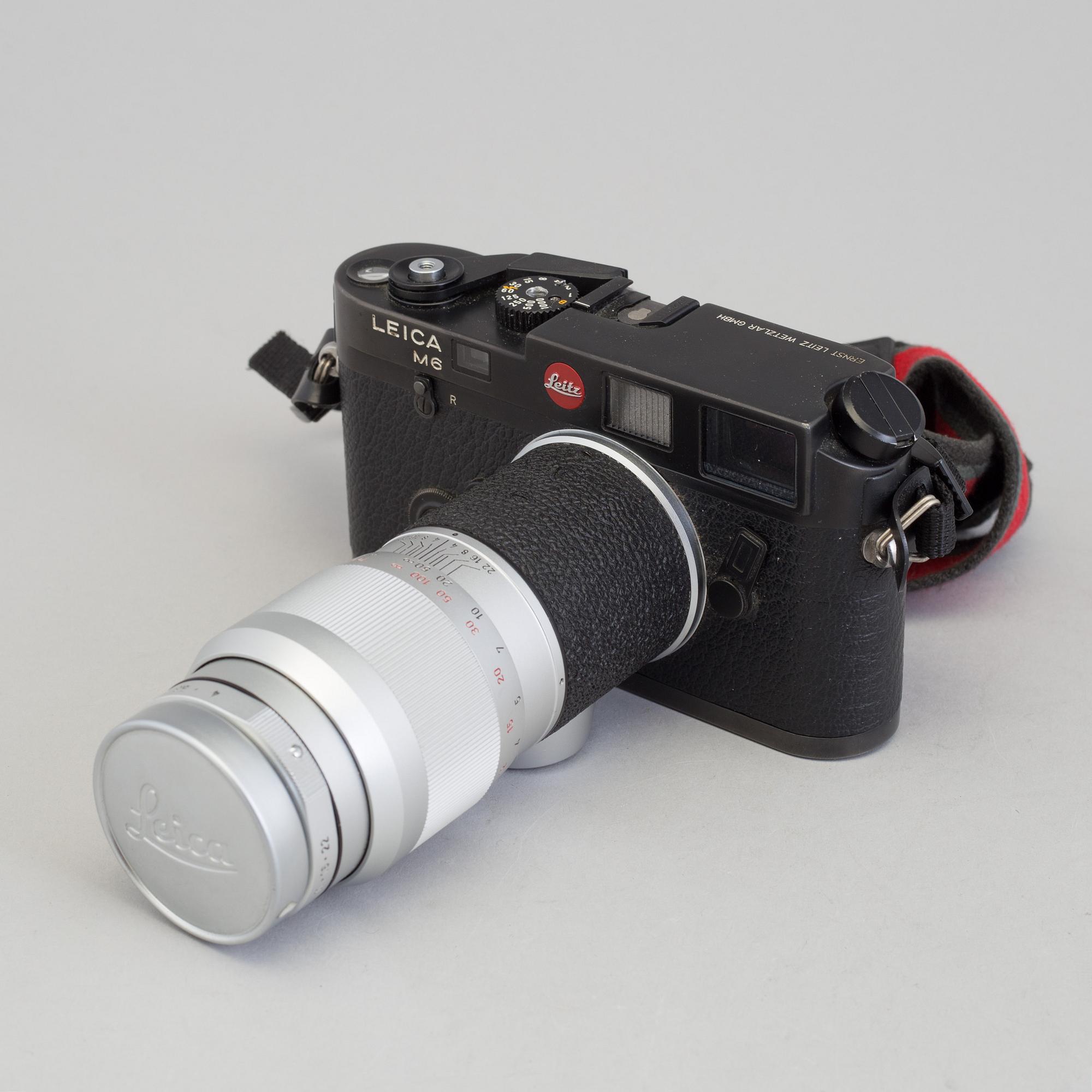 A black body Leica M6 no 1725111 from 1987 with Elmar 1:4/135. With original box.