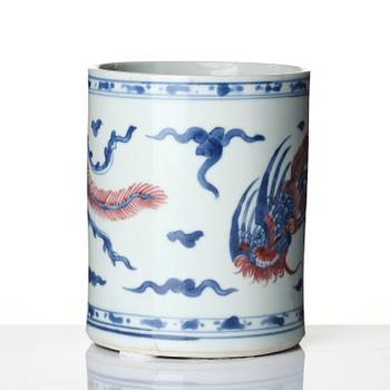 A blue and white and underglaze red 'phoenix' brushpot, Bitong, Qing dynasty, Kangxi (1662-1722).