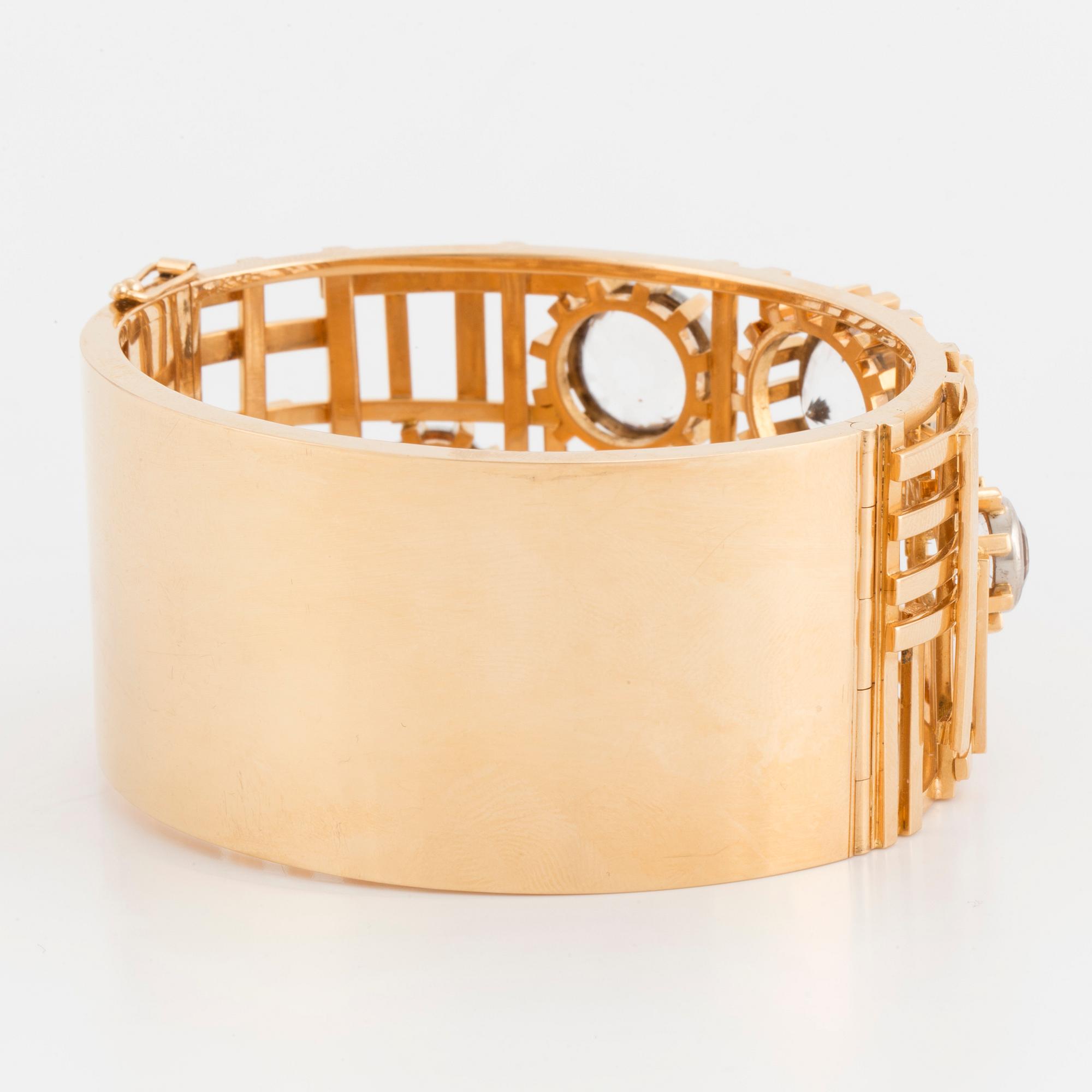 Claës E. Giertta, armring, Stockholm 1966, med fasettslipade bergkristaller, 18K.