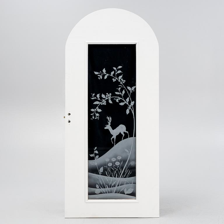 Glössner & Co, a signed glass door.