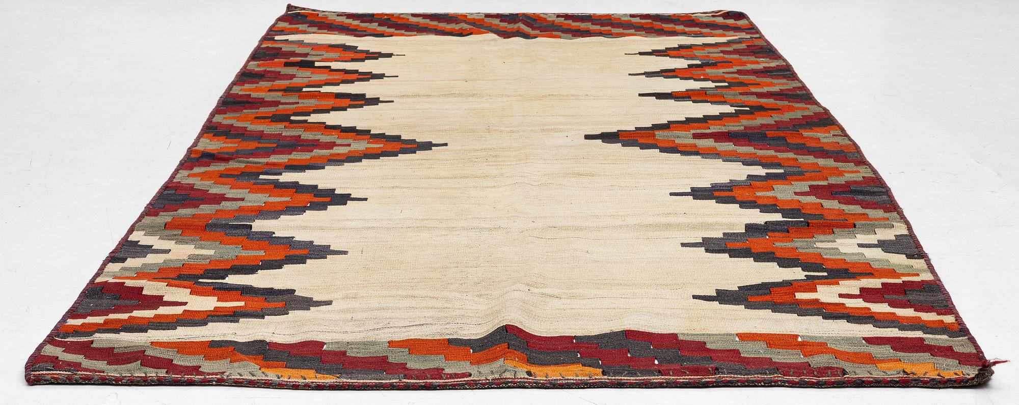 A semi-antique Qashqai kilim, c. 350 x 188 cm.