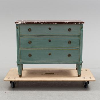 A Gustavian style schest of drawers, mid 20th century.