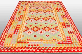 A carpet, Kilim, ca 307 x 205 cm.