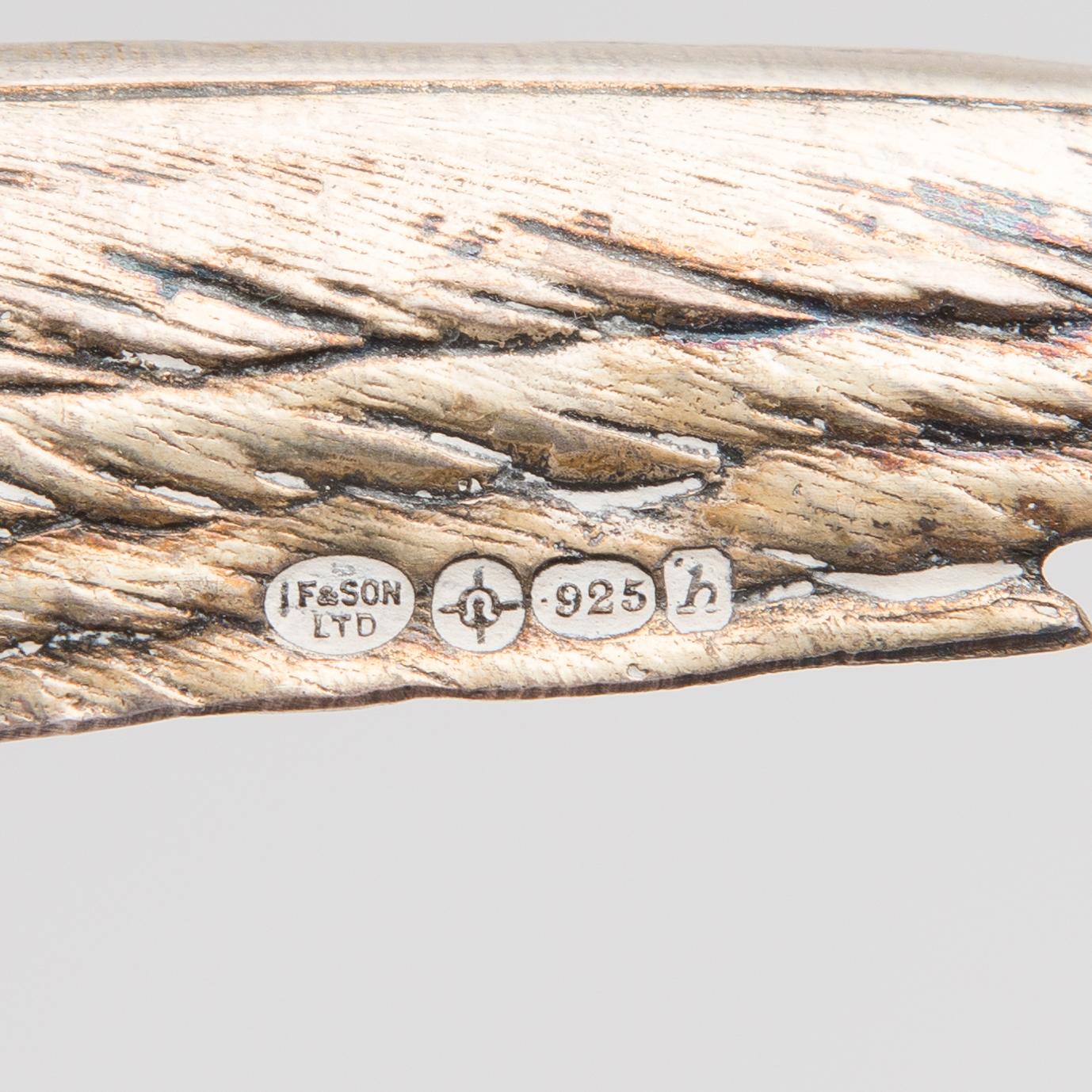 Two bird table decorations in silver, German and British hallmarks.